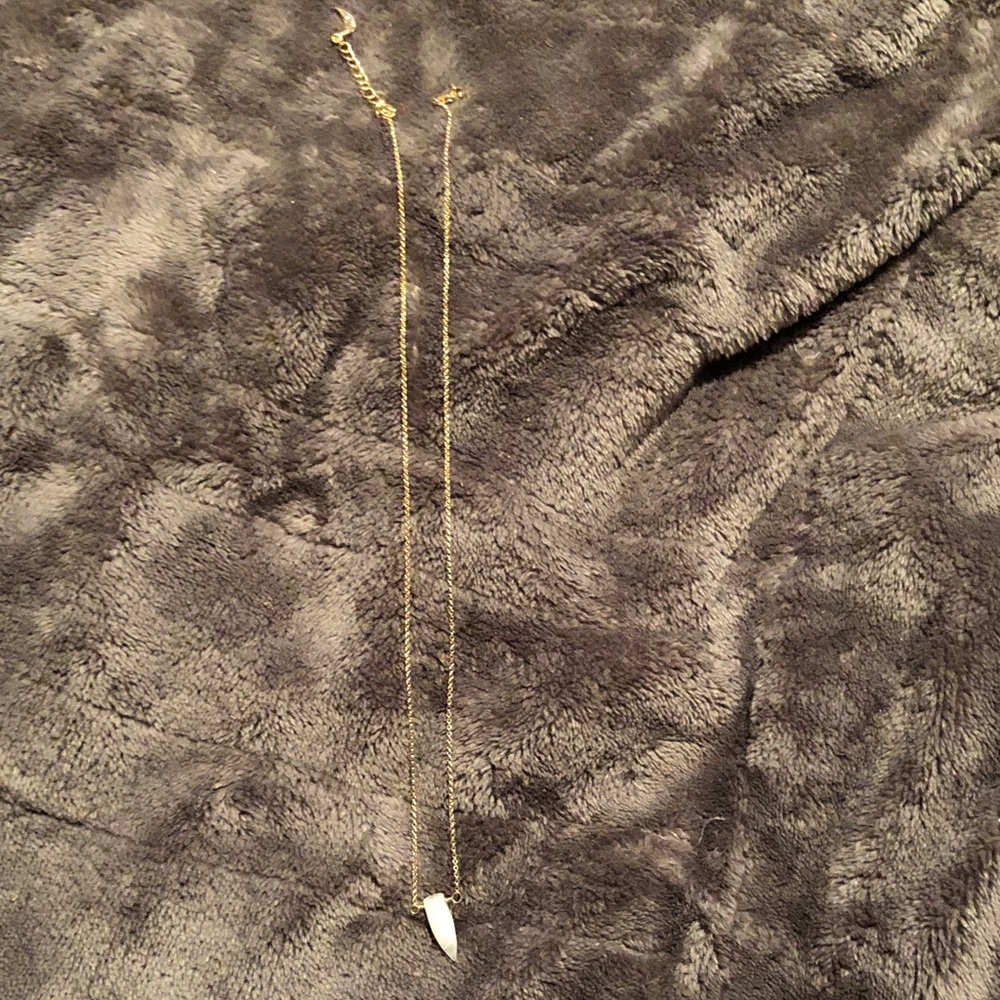 Elegant Gold Necklace with White Stone Pendant